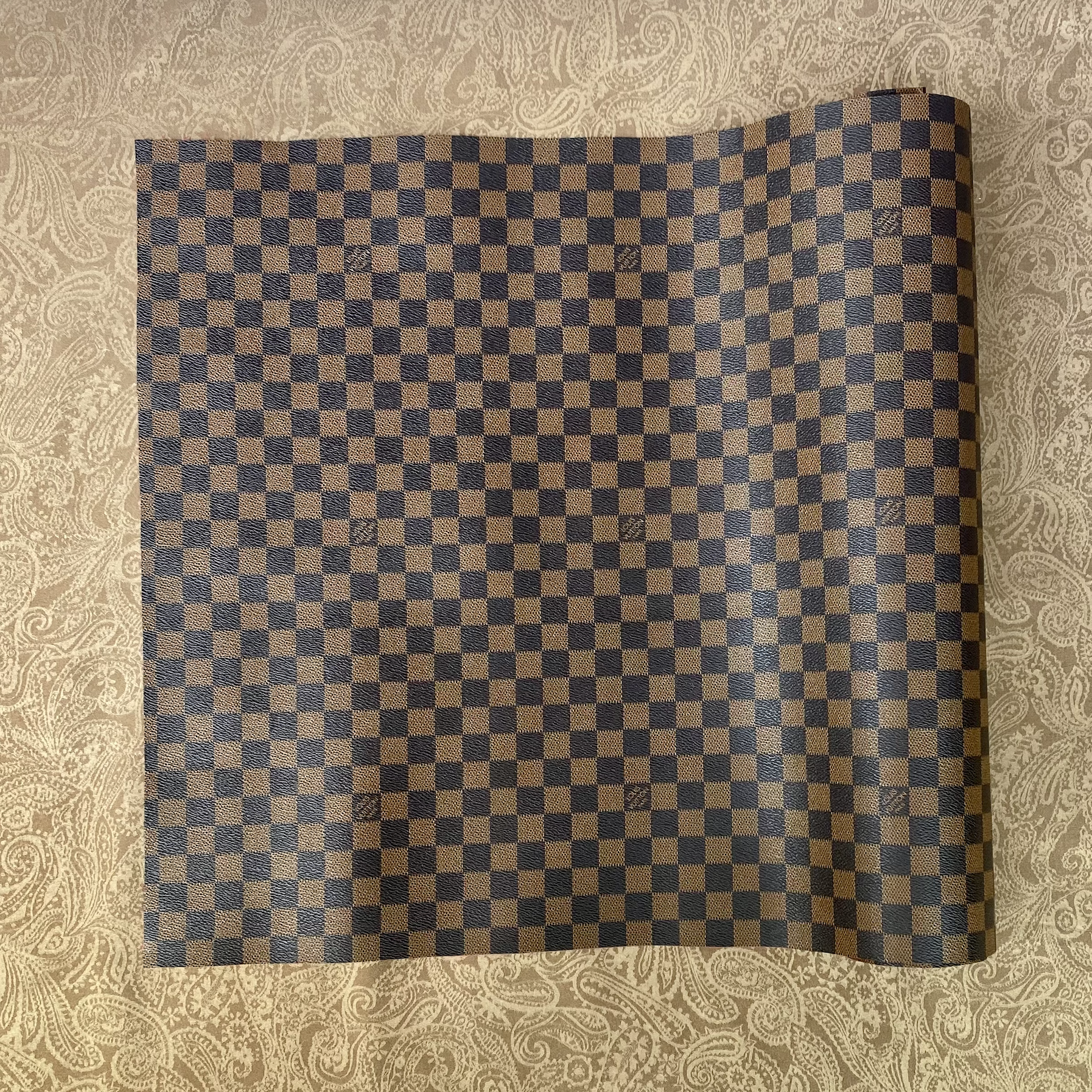 louis vuitton leather material
